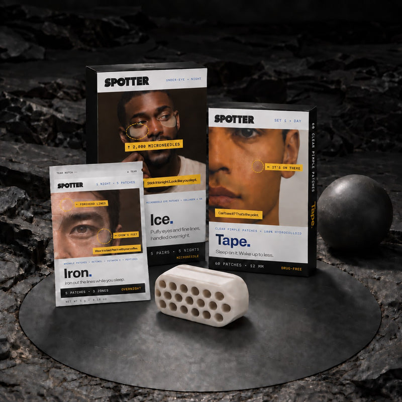 The full Spotter lineup — Tape, Iron, Ice and Grit — staged on a dark rock.