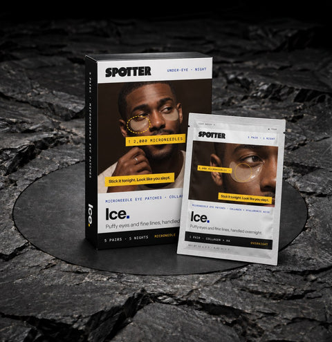 Spotter Ice microneedle eye patch box and pouch on dark stone